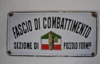 Rarissima insegna fascista in metallo smaltato del FASCIO DI COMBATTIMENTO sezione di POZZOLO  FORMIGARO in provincia di Alessandria cod trgfgc
