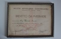 Raro brevetto da infermiere rilasciato dal comando 18 ^ legione M.A.C.A. (MILIZIA ARTIGLIERIA CONTRAEREA) di Roma cod brevinf