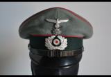 Spettacolare nonche' raro schirmmütze tedesco ww2 da sottufficiale di artiglieria di montagna con nome cod gebart2